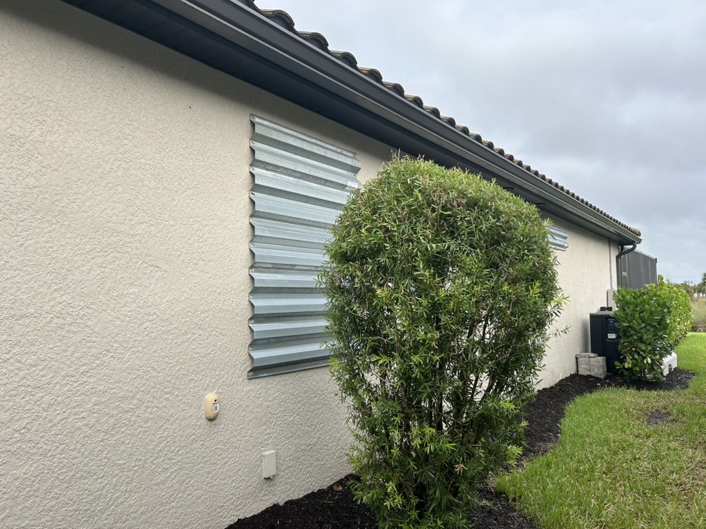 Hurricane shutters installed on home